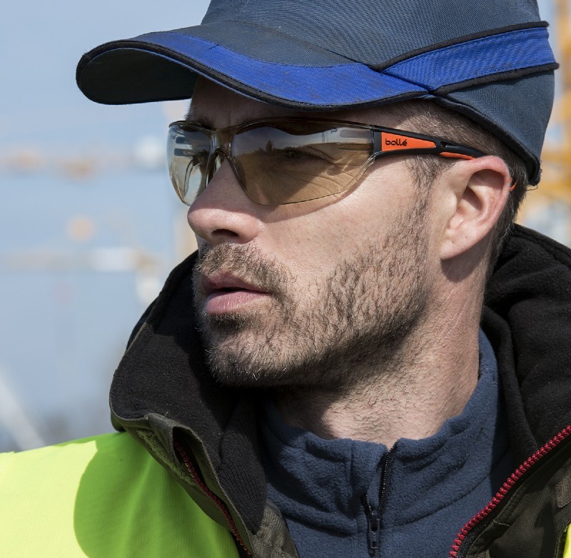 Workman Wearing the Bolle Slam Plus Copper Safety Glasses On Site